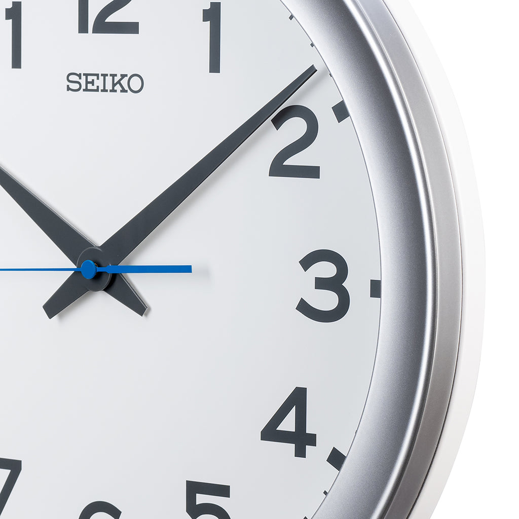 QXA835S White Dial Clock with Blue Quite Sweep Second Hand