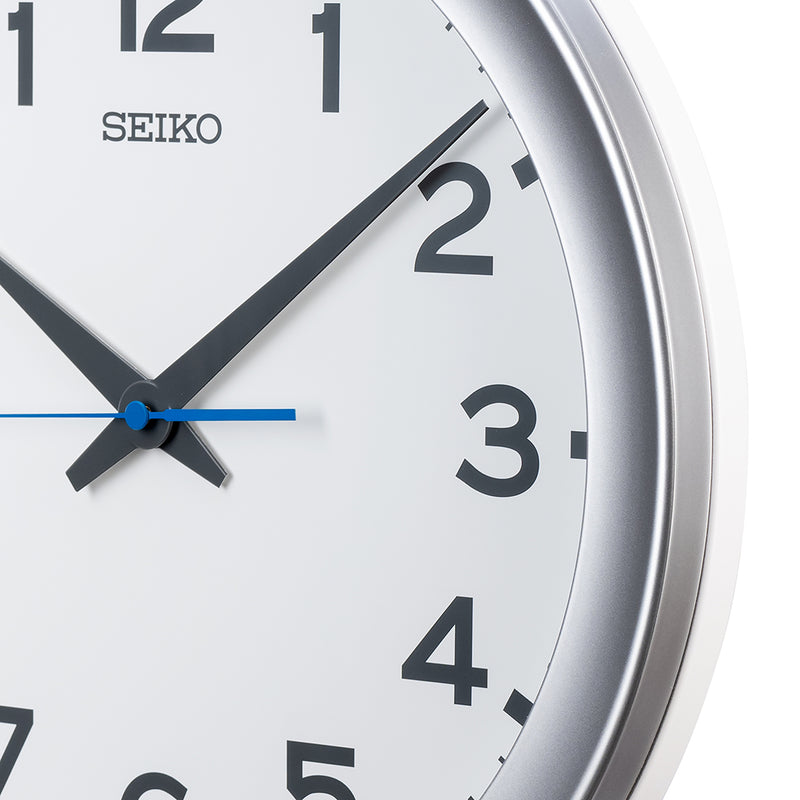 QXA835S White Dial Clock with Blue Quite Sweep Second Hand