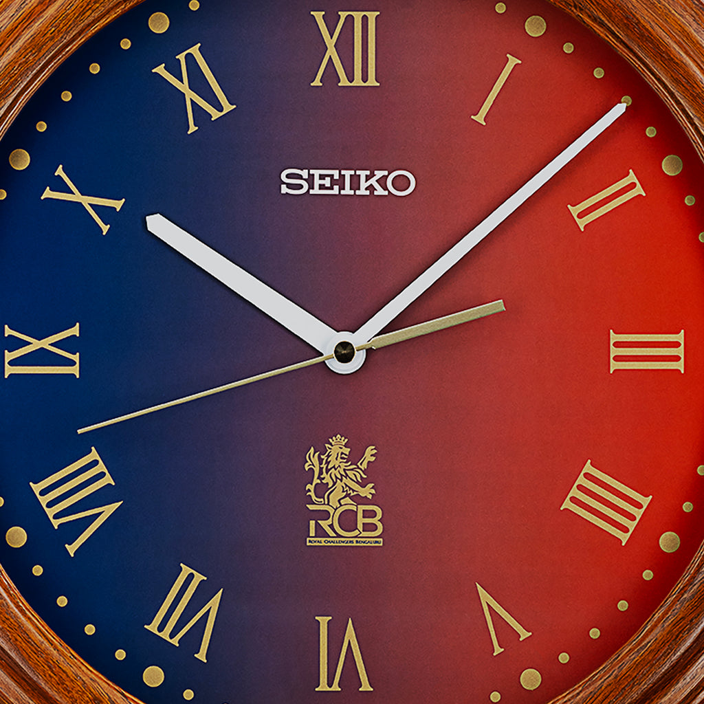 QXA949BN - RCB-Inspired Dial Clock